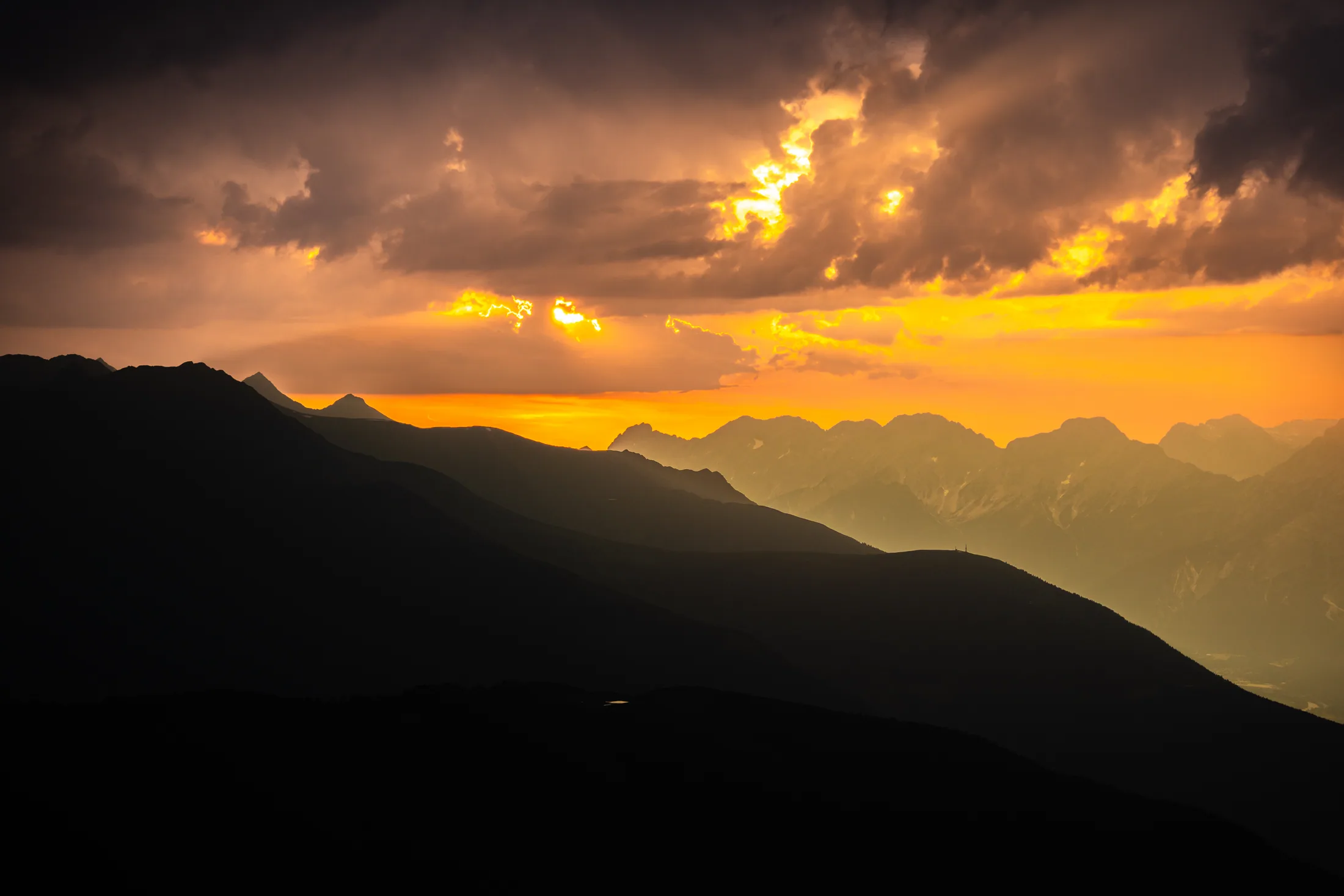 Golden sunset over the mountains at Axamer Lizum